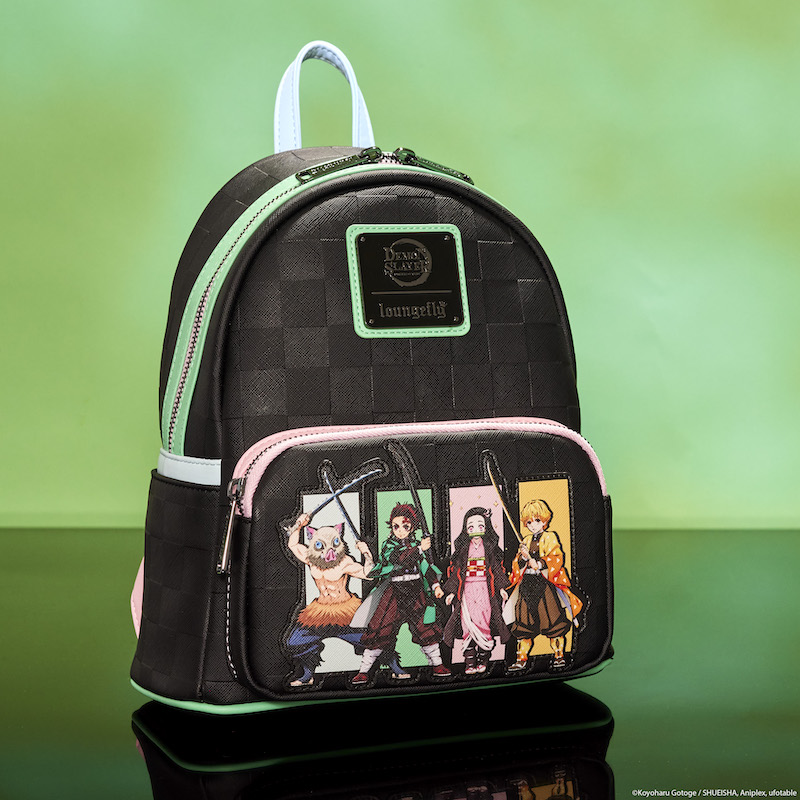 Loungefly Demon Slayer Heroes Group Mini Backpack sitting against a foggy green background 